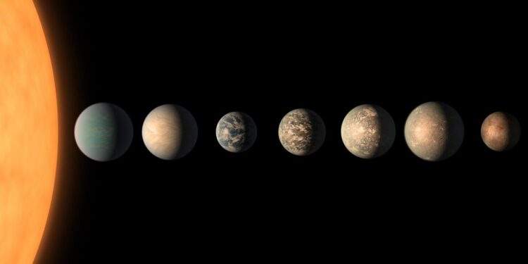 Rappresentazione artistica del sistema planetario TRAPPIST-1. Credits: NASA, JPL/Caltech, and R. Hurt and T. Pyle (IPAC)